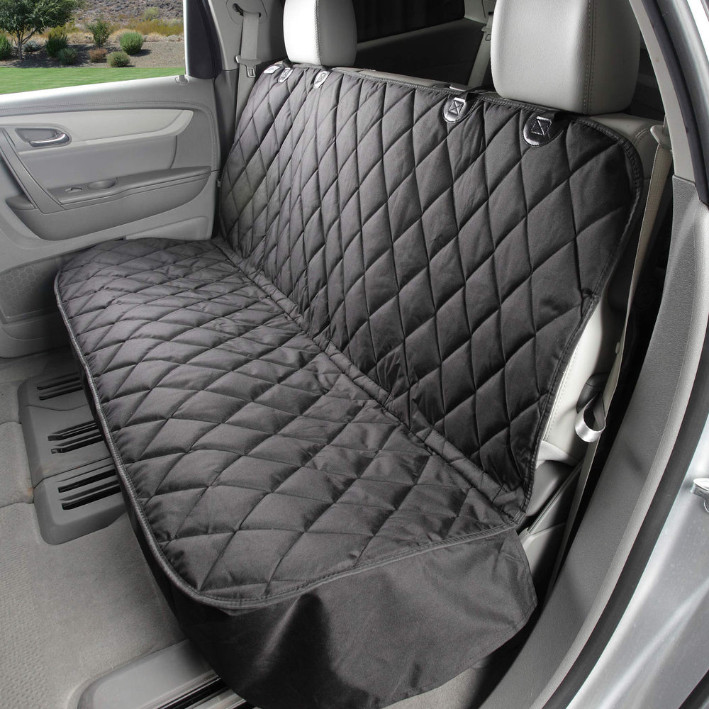 4Knines back-seat cover installed protects car upholstery during pet rides.