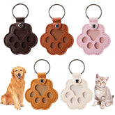 Aanqilze paw-design keychain closeup, a durable leather keepsake for pet memories