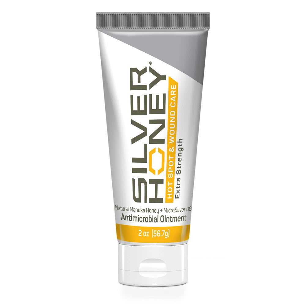 Absorbine Silver Honey hot spot ointment applied to a dog for quick relief.