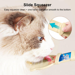 Aerbee cat strip feeder spoon blue demonstrates squeeze-and-serve action for mess-free feeding.