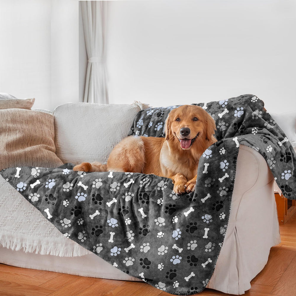 AIWEK waterproof dog blanket pattern close-up shows PU coating and plush Sherpa interior for protection