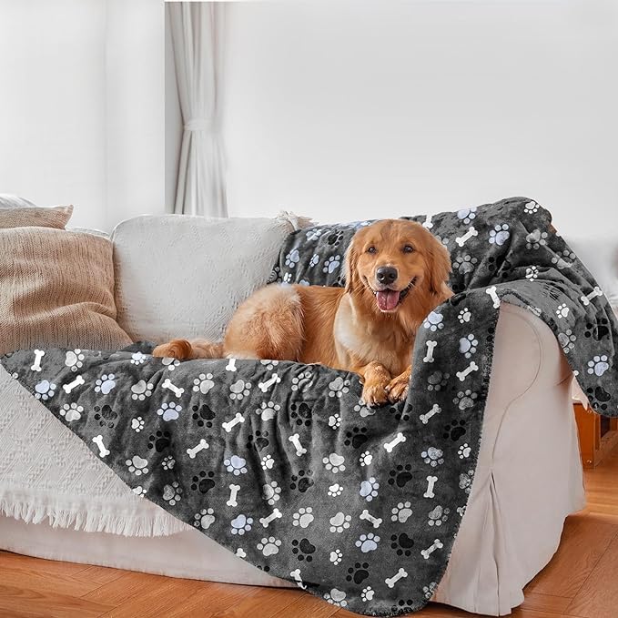 AIWEK waterproof dog blanket on sofa protects against spills and fur.