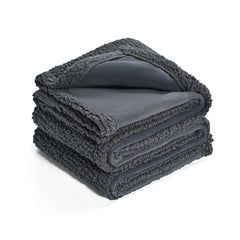 Amazon Basics pet blanket on sofa showing generous size for pets