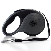 American Kennel Club retractable leash with extended reach enables safe, controlled exploration.
