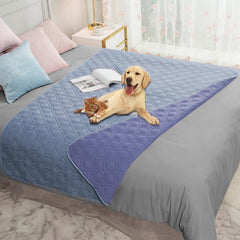 Ameritex waterproof dog bed cover folded on sofa protecting furniture from spills.