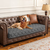 Ameritex Waterproof Dog Bed Cover on sofa protects furniture from spills.