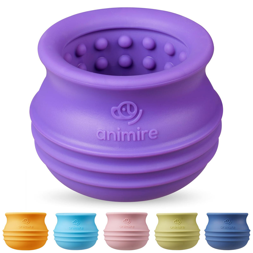 Animire treat-dispensing dog toy purple front view supports interactive feeding and play.