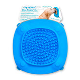 Aquapaw Lick Mat suction cups on shower wall improve bath time with tasty distraction.
