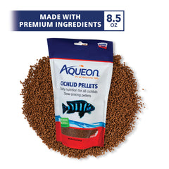 Aqueon Cichlid Food Mini pellets close-up emphasizing shrimp and squid ingredients.