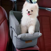 Asou dog car seat centre console view shows secure booster for small dogs.