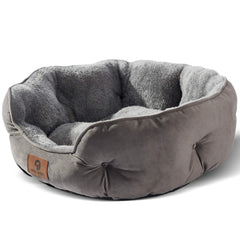 Asvin small dog bed in sherpa fleece for cozy naps.