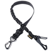 AUBELL dog seat belt 3-in-1 system securing a small dog, reducing driver distraction during trips.
