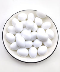 Azatemgo pigeon eggs in smooth white plastic for durable nesting aids.