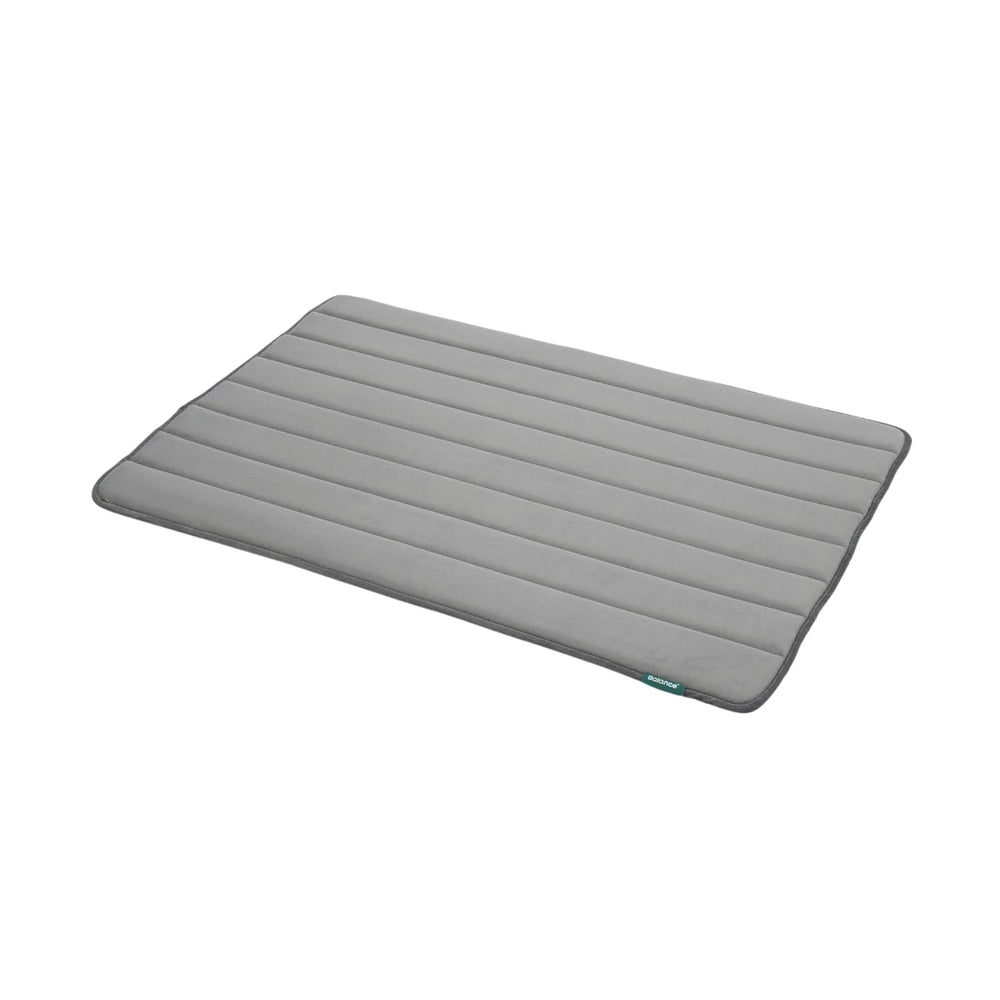 BALANCE dog crate pad foam closeup highlights plush, supportive resting surface for pets.