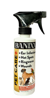Banixx Pet Care spray on a wound during daily care for pets and horses