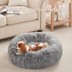 BedStill donut dog bed side view highlights raised edge for secure rest.