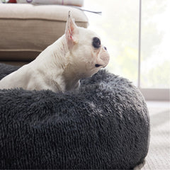 Bedsure round bed with raised rim supports head and neck for restful lounging