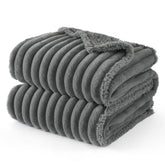 Bedsure waterproof dog blanket protects couch from spills and hair for large dogs.