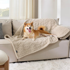 Bedsure waterproof dog blanket on couch protector guards furniture against spills.