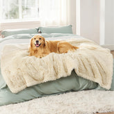 Bedsure waterproof dog blanket cream protecting a sofa from pet messes
