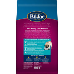 Bil-Jac Picky No More Small Breed dog eating happily from a bowl.