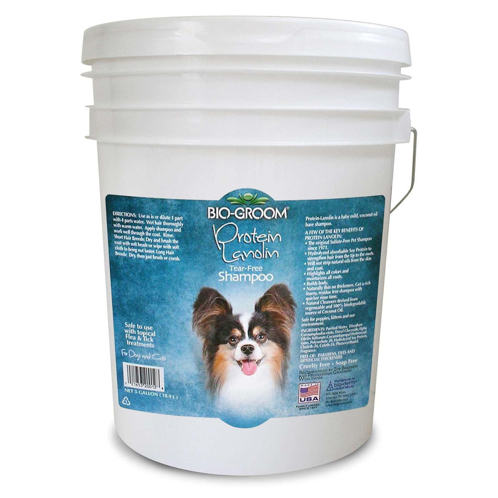 Bio-Groom Protein Lanolin Dog Shampoo bottle front shows tear-free formula for gentle baths.