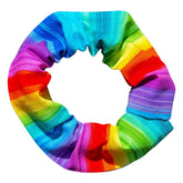 Birdsbesafe Rainbow Sally cat collar cover closeup shows vibrant rainbow pattern for bird visibility.