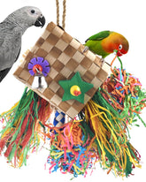 Bissap Bird Chew Toy with natural palm frond hanging for beak exercise and enrichment.