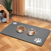 BLUE AYE pet feeding mat absorbs spills to protect wooden floors.