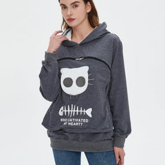 Bombaxceiba Pet Pouch Hoodie eye window closeup emphasizes airflow and pet visibility.