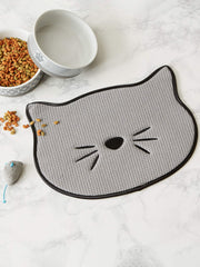 Bone Dry 9.75x13.5-inch pet mat provides a portable dining area.