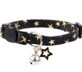 BoomBone Star Charm collar close-up on black fabric, emphasizing breakaway safety.