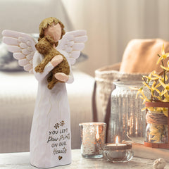 BORLESTA dog memorial angel figurine, closeup paint details, capturing delicate color tones and craftsmanship.
