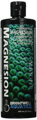 Brightwell Aquatics Magnesion bottle pouring for precise magnesium dosing in reef tanks.