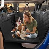 Btefd XL Truck Back Seat Extender setup shows expanded space for dogs on trips.