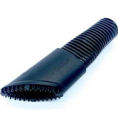Buff Brite Fur-Eel Pro removing pet hair from a car seat.