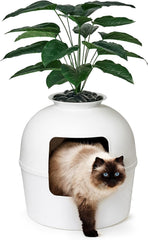 Bundle & Bliss Secret Litter Box hides litter with decorative planter for privacy.