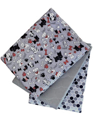 Caldwell's Potty Pad unfolded shows a large washable surface for puppy training.