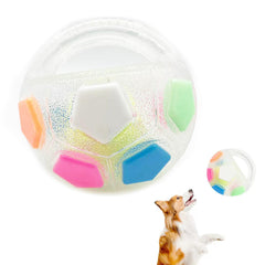 Calming Ball with Handle closeup shows a secure grip for easy fetch and retrieval.
