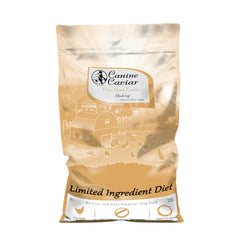 Canine Caviar Free Spirit chicken pearl millet kibble closeup showing grain-free texture