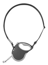 Canine Curation retractable leash with shoulder strap enables hands-free walking.