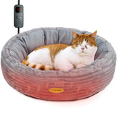 CANMIL heated cat bed donut shape provides cozy warmth and security for pets.