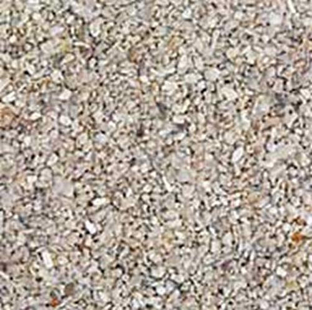Carib Sea ACS00050 aragonite reef sand pouring demonstrates reef-appropriate substrate for marine tanks
