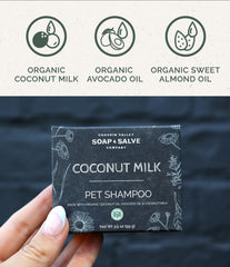Chagrin Valley dog shampoo bar on paw illustrating easy palm-sized bath