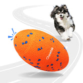 Cheerble Wicked Rugby squeaky-ball in action for fetch and interactive play.