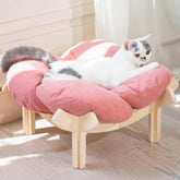 CHEERHOME PETS elevated cat bed with wooden base pink demonstrates sturdy support for restful lounging.