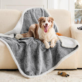 ChiXnuggle dog blanket waterproof on couch protects furniture from spills.