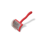 Chris Christensen Big G Slicker Brush deshedding action targets undercoat for double-coated breeds.