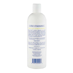 Chris Christensen Happy Eyes tearless shampoo applied near eyes for gentle cleansing.