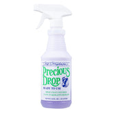 Chris Christensen Precious Drop bottle showing keratin-infused conditioner for frizz control